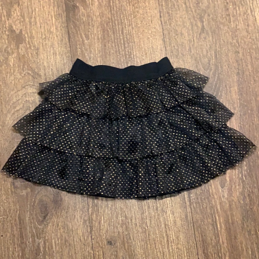 Girls 4T black with gold polka dots ruffled skirt.